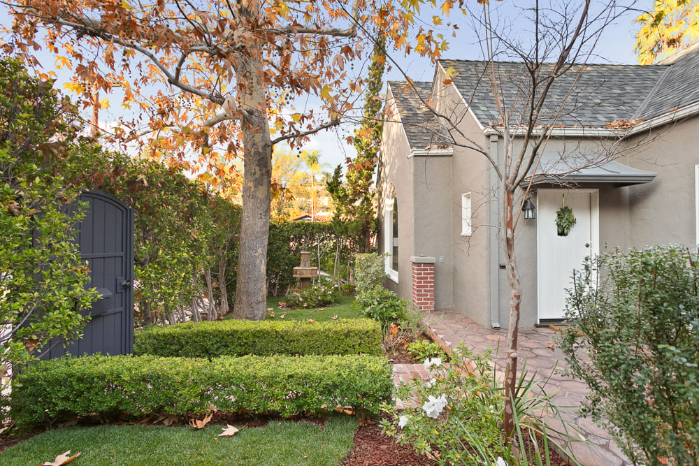 Updated and romantic Country English nestled privately in the Franklin Hills 