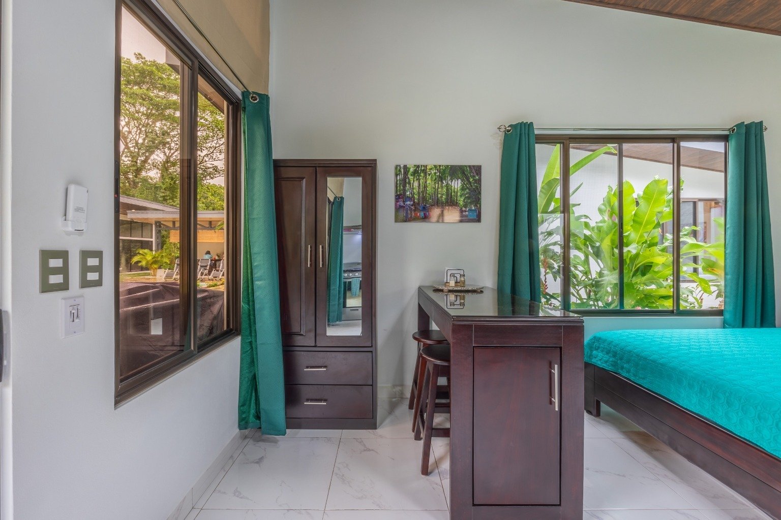 Incredible turnkey investment opportunity, 3 Rental villas, and a 2 Bedroom Home with a large pool.