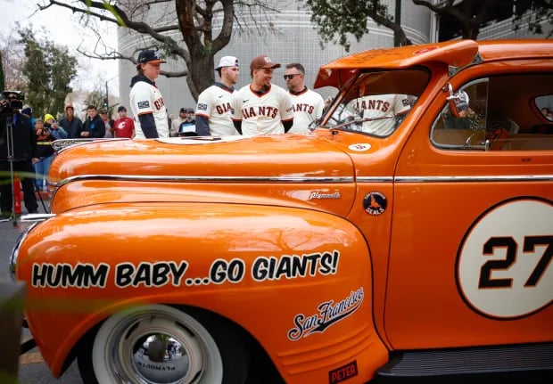 On Jan. 25, 2025, Giants players Hayden Birdsong, Landen Roupp, Willy Adames, and J.P. Martinez check out a “Humm Baby…Go Giants!” car at the 2025 FanFest Tour in San Jose. Photo by Shae Hammond, Bay Area News Group.