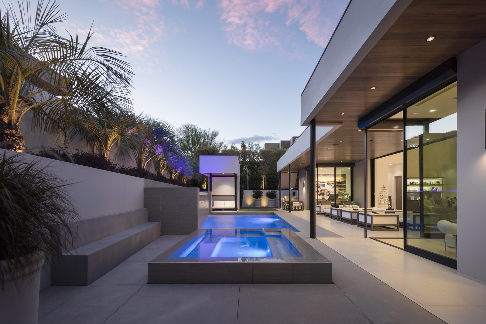 Lit spa and covered patio at a Ridges home
