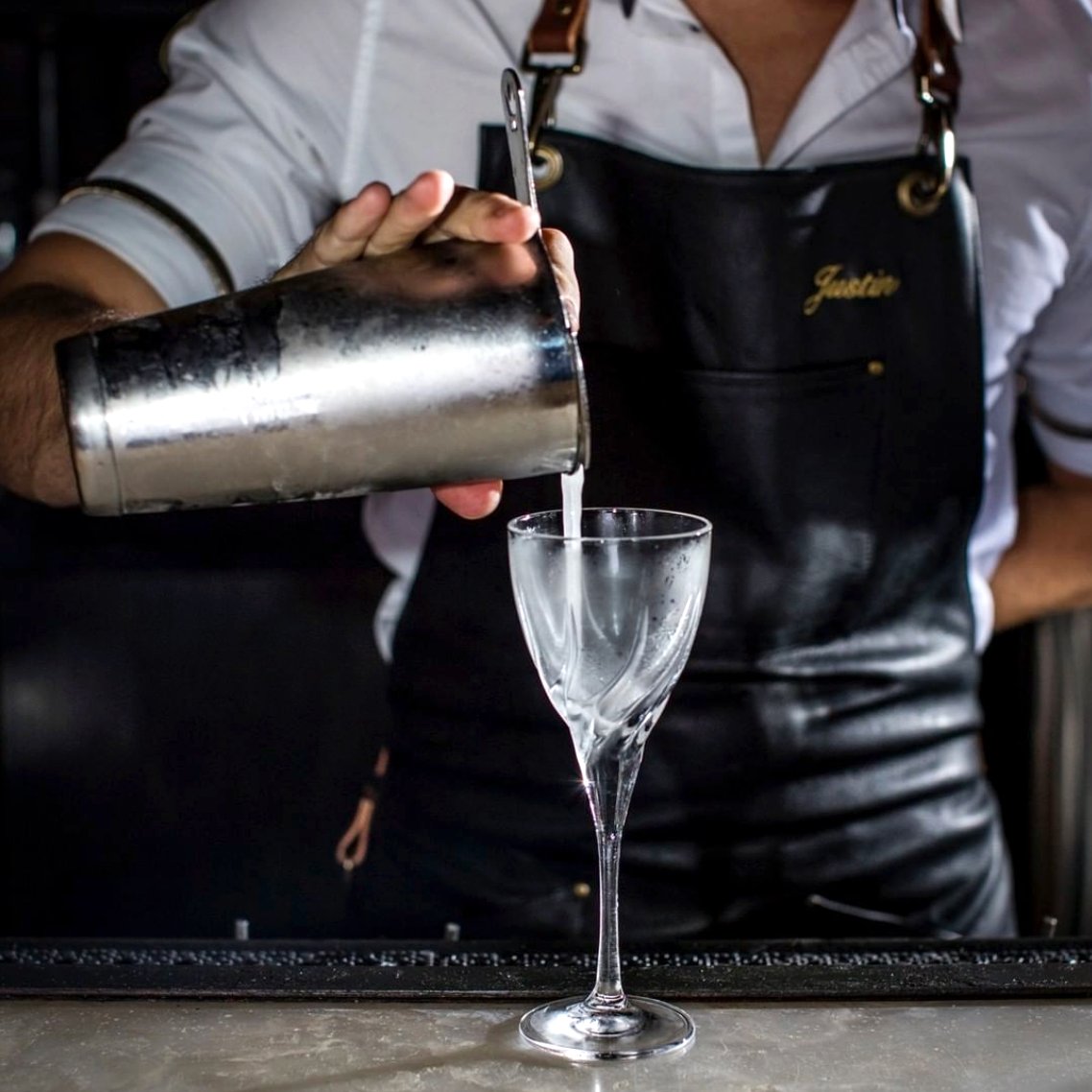 People toasting with wine glasses