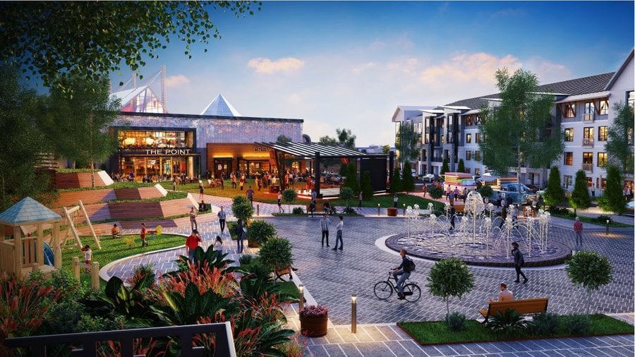 Proposed mixed-use development with shops, apartments, landscaped walkways, and a central fountain plaza.