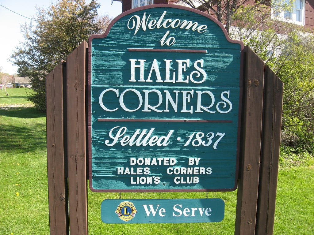 Welcome to Hales Corners sign with Settled 1837 lettering