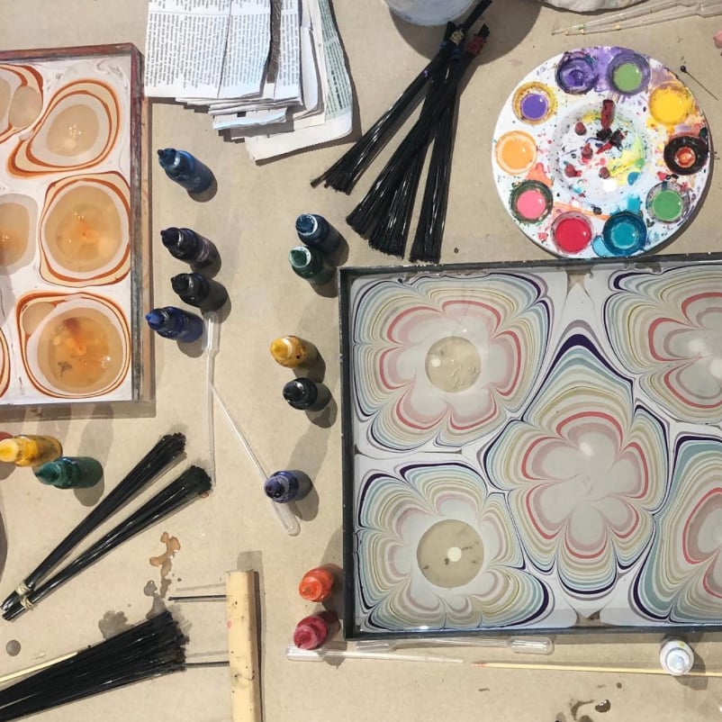 People toasting with wine glasses