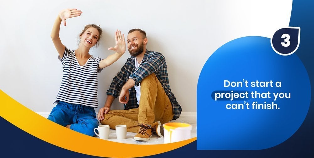 Tip 3: Don’t start a project that you can’t finish; a smiling couple sits beside paint supplies.