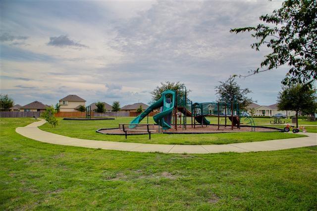 Rare Cul-de-Sac Gem in Manor – With No Neighbor on One Side and Access to HOA-owned Greenspace Right Outside Your Doorstep!