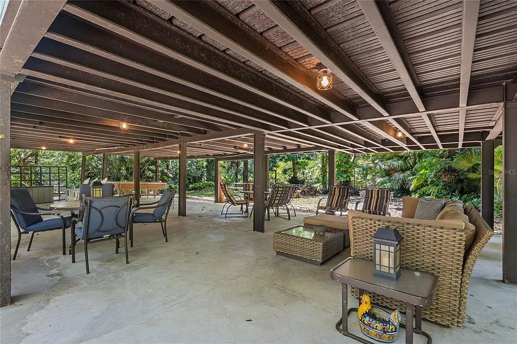 Covered outdoor patio with wicker seating