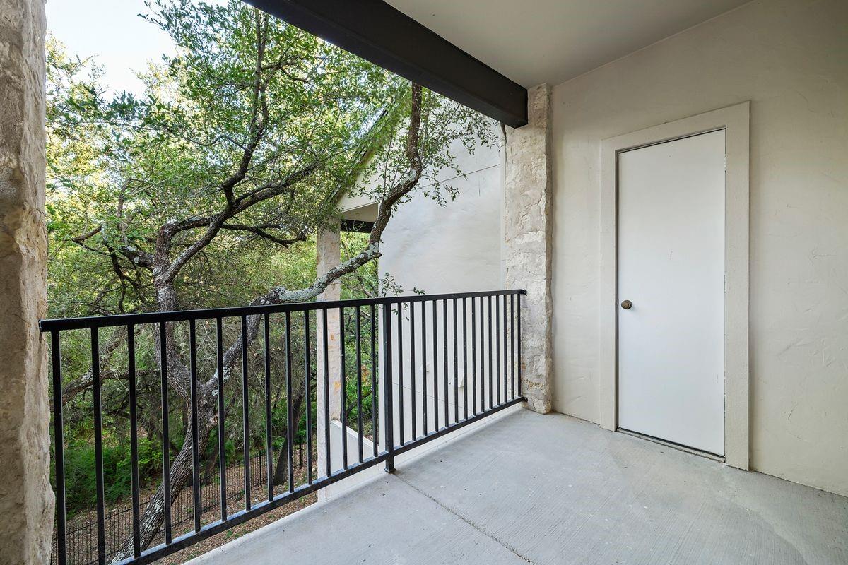 Private balcony with a greenbelt view, Barton Hollow, Westlake, Austin.