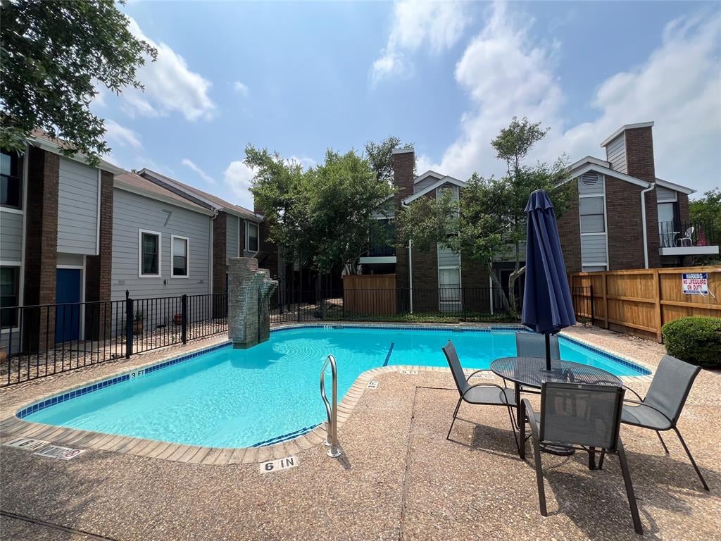 Charming Two-Story Condo in Gated Summerwind w/ Fireplace & Balcony