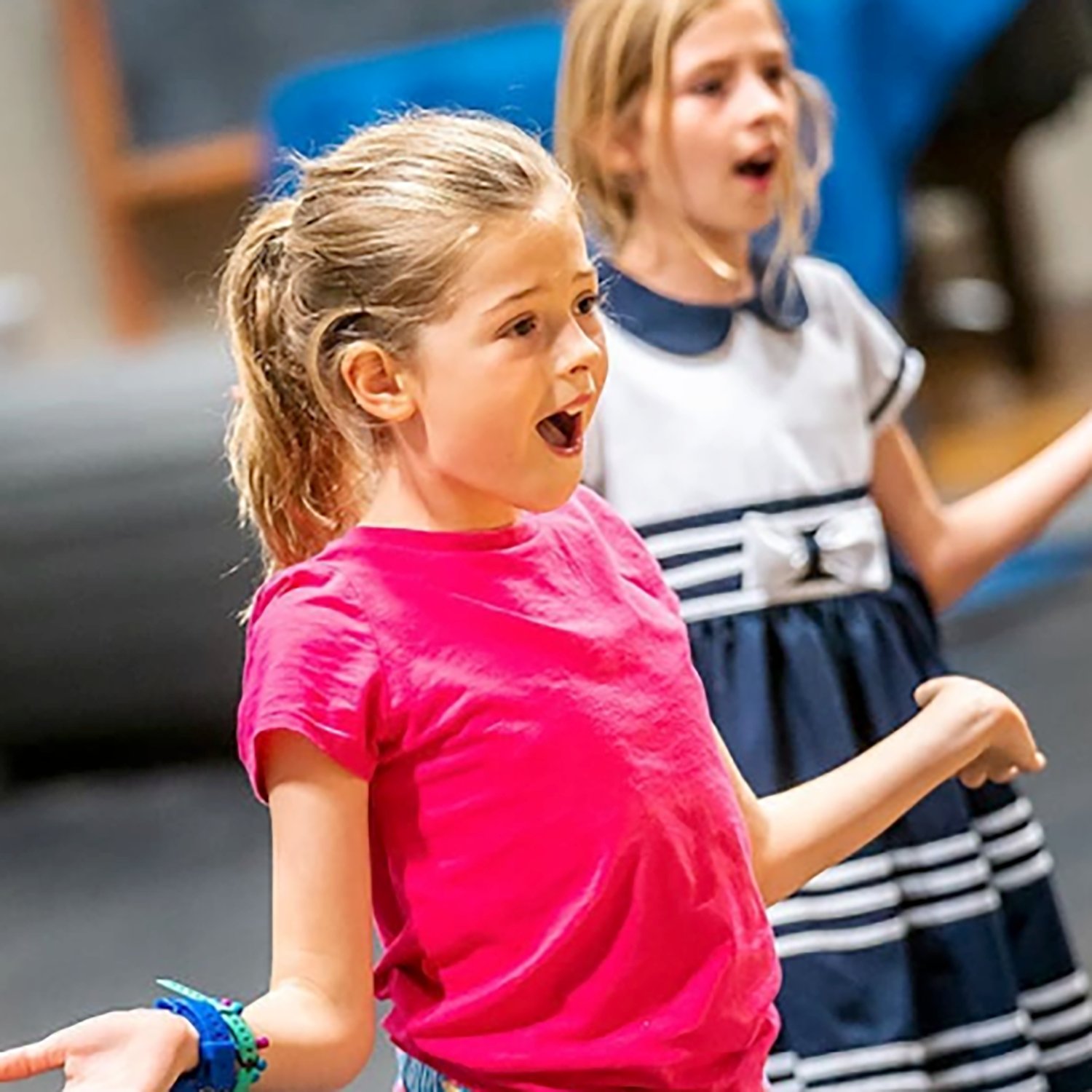 People toasting with wine glasses