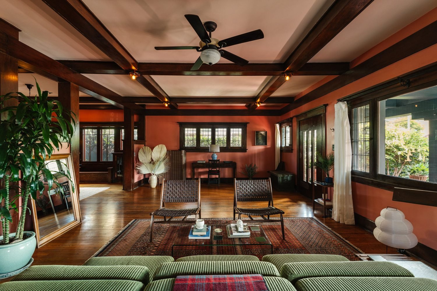 The A.C. Tobias Residence, a 1908 Craftsman bungalow in Los Angeles with a deep front porch and mature landscaping.