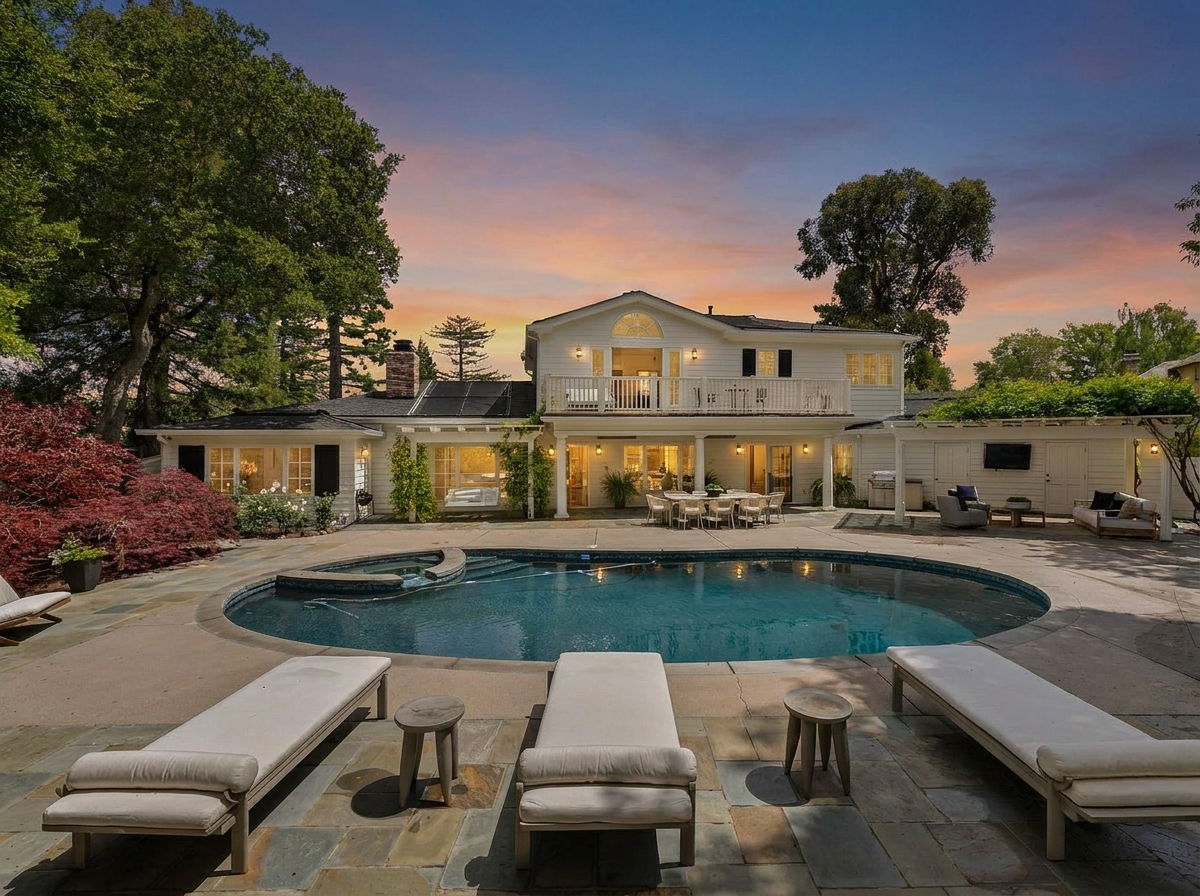 Hillsborough luxury estate at twilight sold by Sternsmith Group, top realtor in San Mateo County.