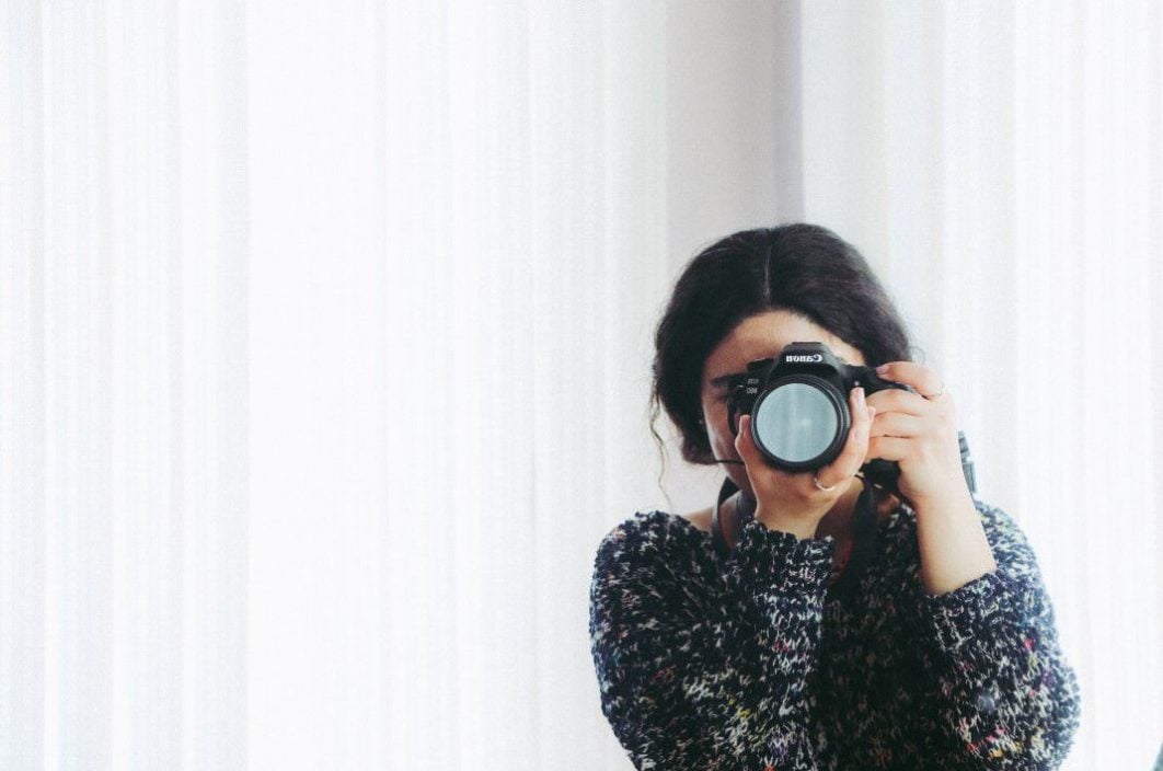 negative-space-woman-reflection-canon-camera-photographer