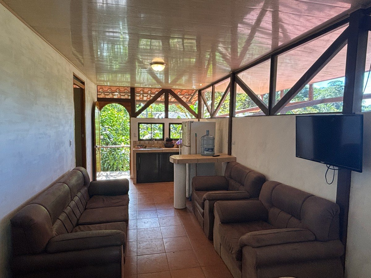 0.16 Acres – 4 Living Units, 7 Bedroom Riverfront Investment Package Near Dominical Beach With Owner Financing!!!
