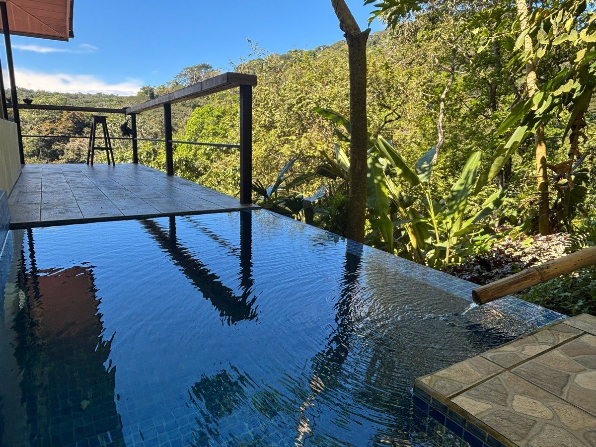 0.16 Acres – 4 Living Units, 7 Bedroom Riverfront Investment Package Near Dominical Beach With Owner Financing!!!