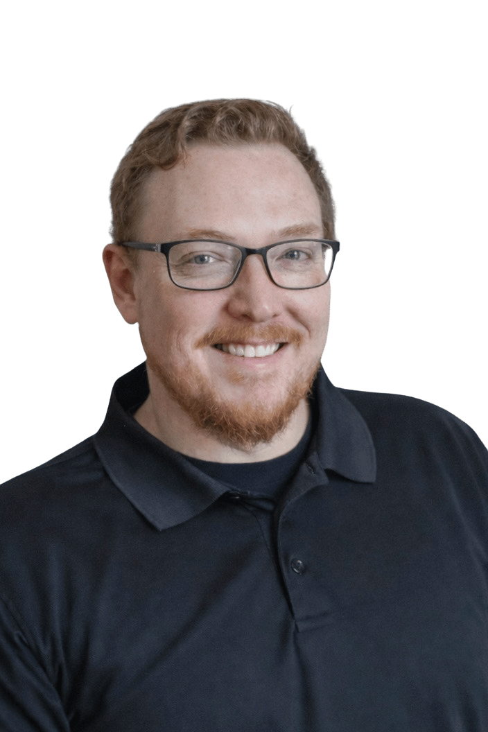 Brandon Long, a smiling realtor wearing glasses and a dark polo shirt.