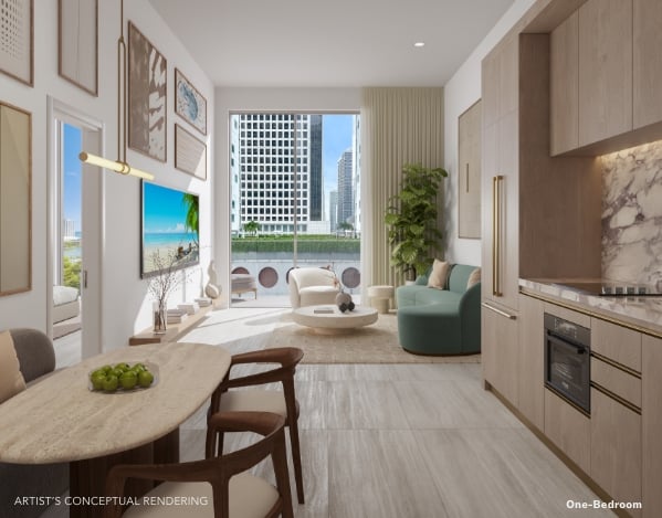 One-bedroom apartment interior with an open kitchen, dining area, and city buildings visible through the windows.