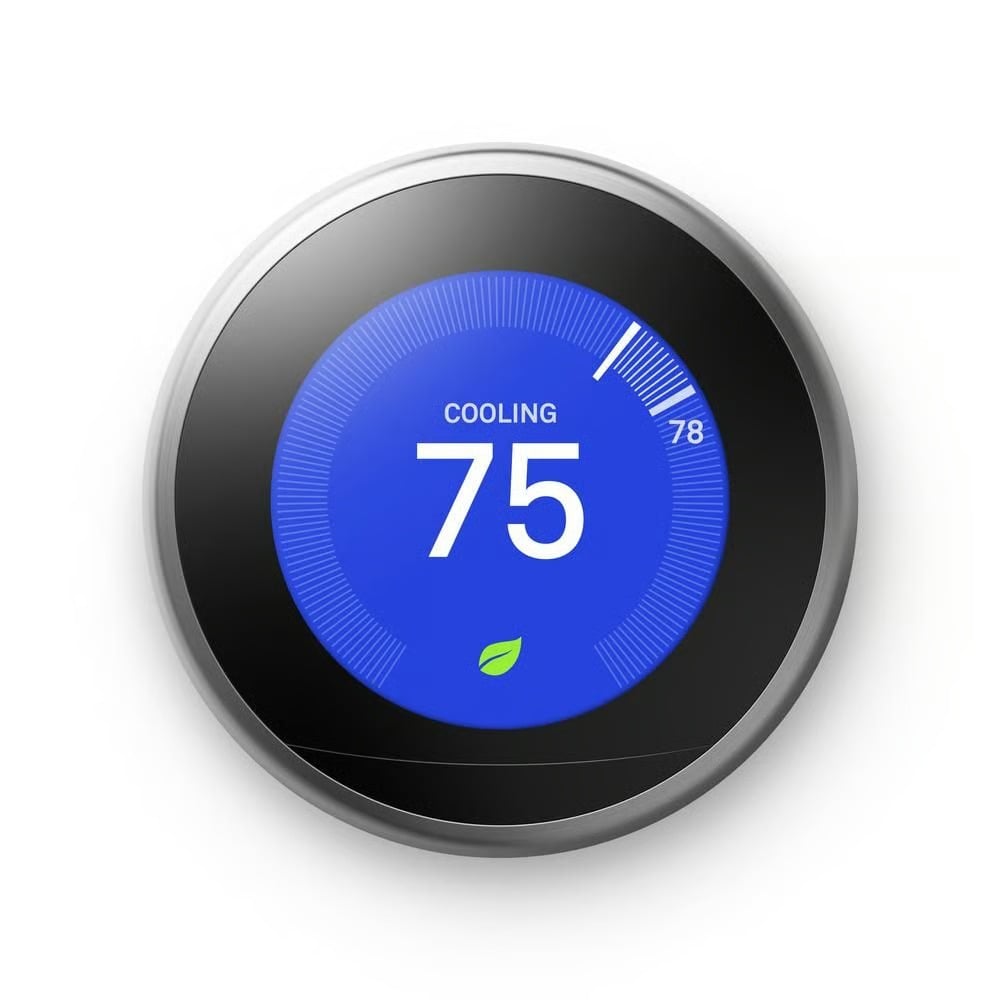 Round smart thermostat displaying cooling at 75 degrees with a green leaf icon.