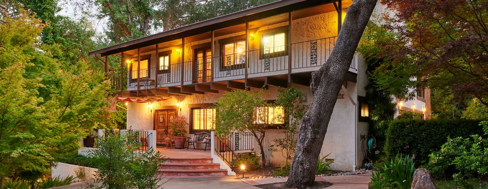 Grand is the best word to describe this architecturally stunning Spanish style home