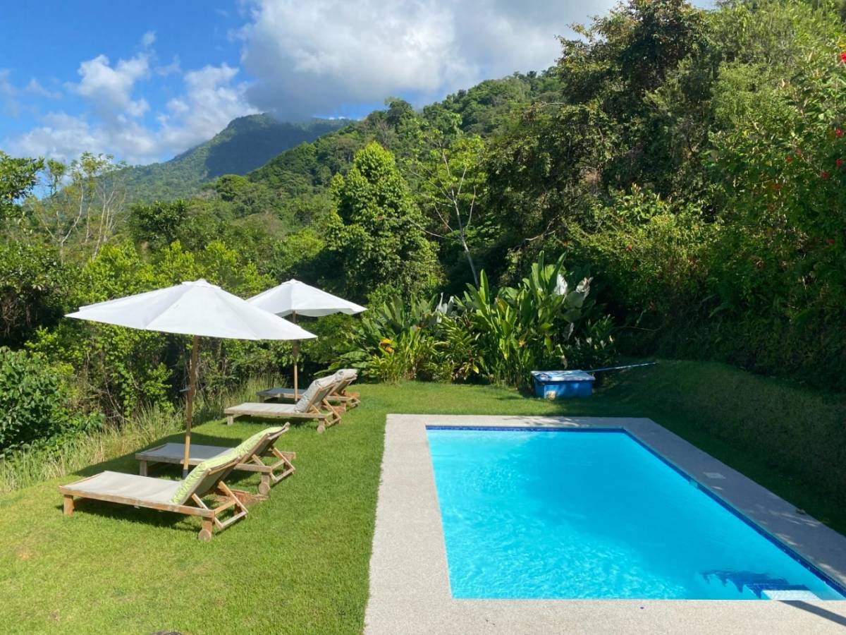 Terra Lodge - Income producing property with two apartments, swimming pool and 1 bedroom home.