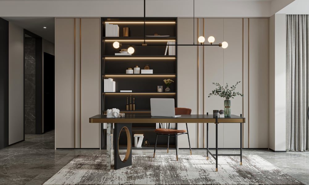 Modern home office with illuminated built-in shelves, a long desk, and a patterned rug.