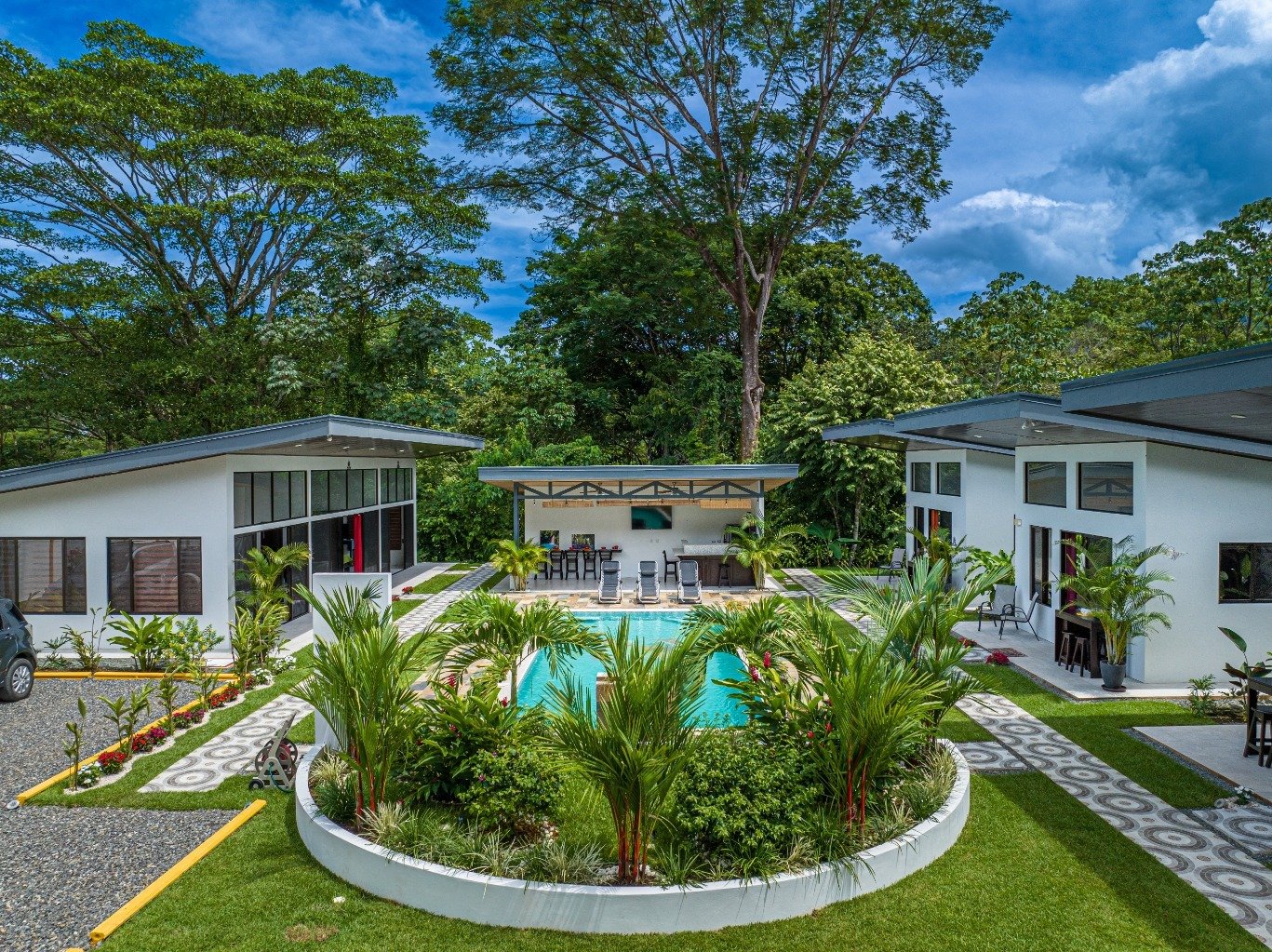 Incredible turnkey investment opportunity, 3 Rental villas, and a 2 Bedroom Home with a large pool.