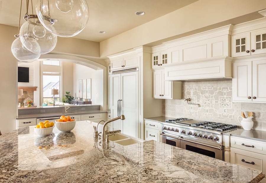Well-staged kitchen and adjoining family room in an Edina luxury home