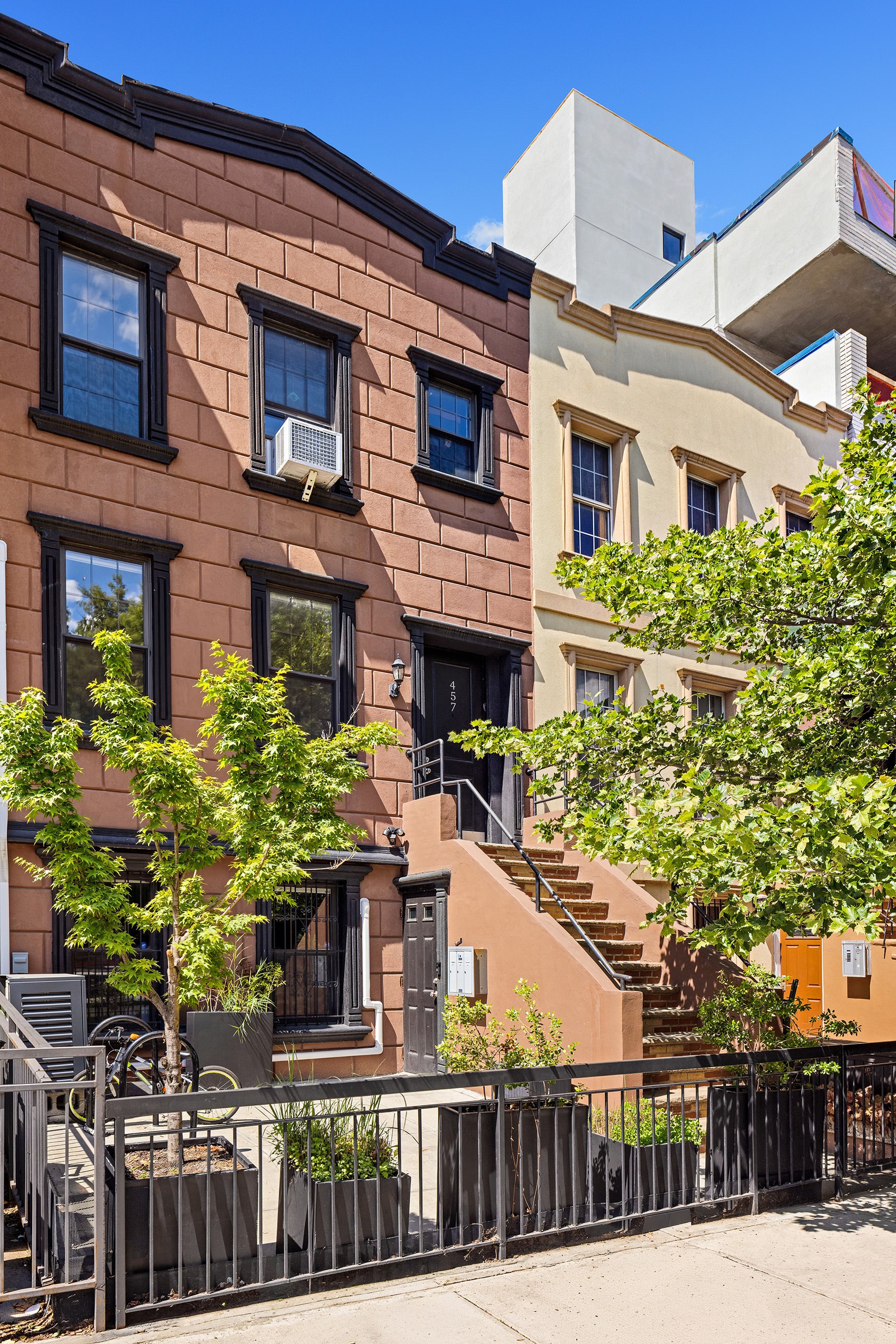 Front facade and stoop of 457 Lexington Avenue in Bedford-Stuyvesant, Brooklyn.