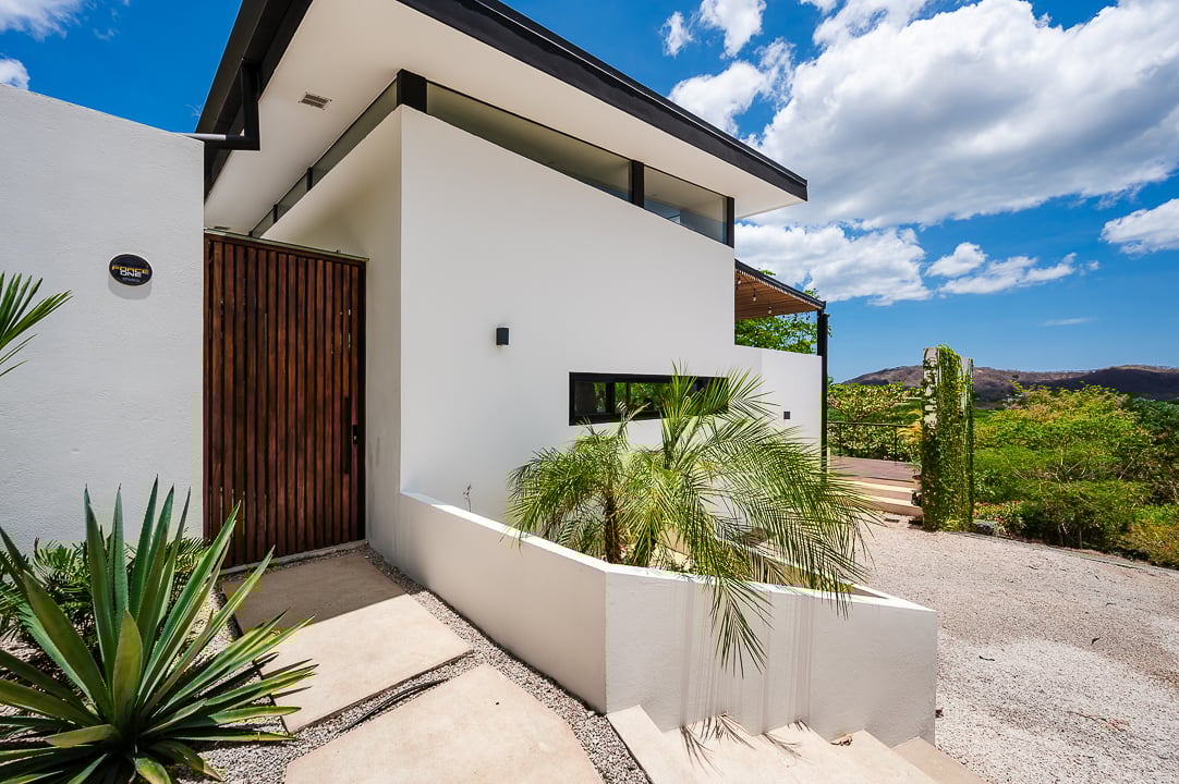 Casa Kalachuchi | Gorgeous Modern Jungle Oasis with Sunset Views in Gated Community