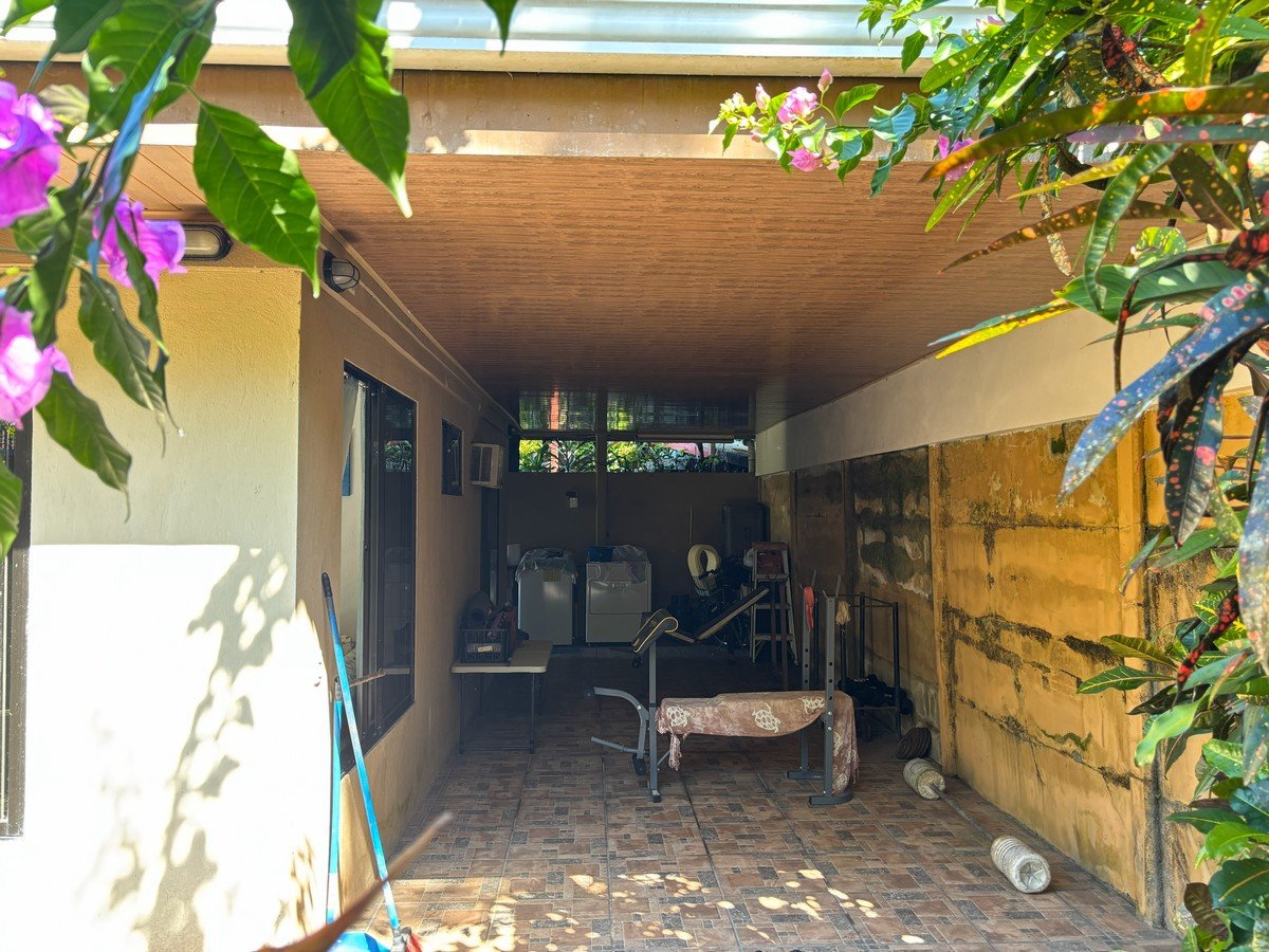0.16 Acres – 4 Living Units, 7 Bedroom Riverfront Investment Package Near Dominical Beach With Owner Financing!!!