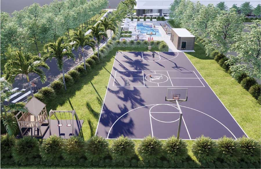 Aerial view of Tal Aventura’s basketball court, pool, and playground amid landscaped grounds.