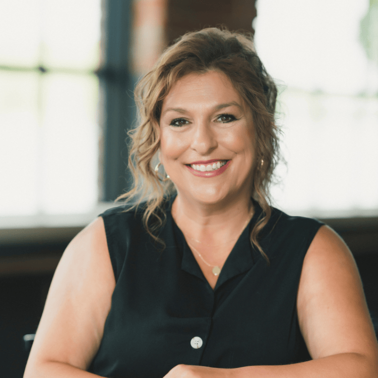 Professional headshot of Julie Delap, a trusted La Crosse, WI real estate agent specializing in buying and selling homes across the Driftless Region, Minnesota, and Wisconsin.