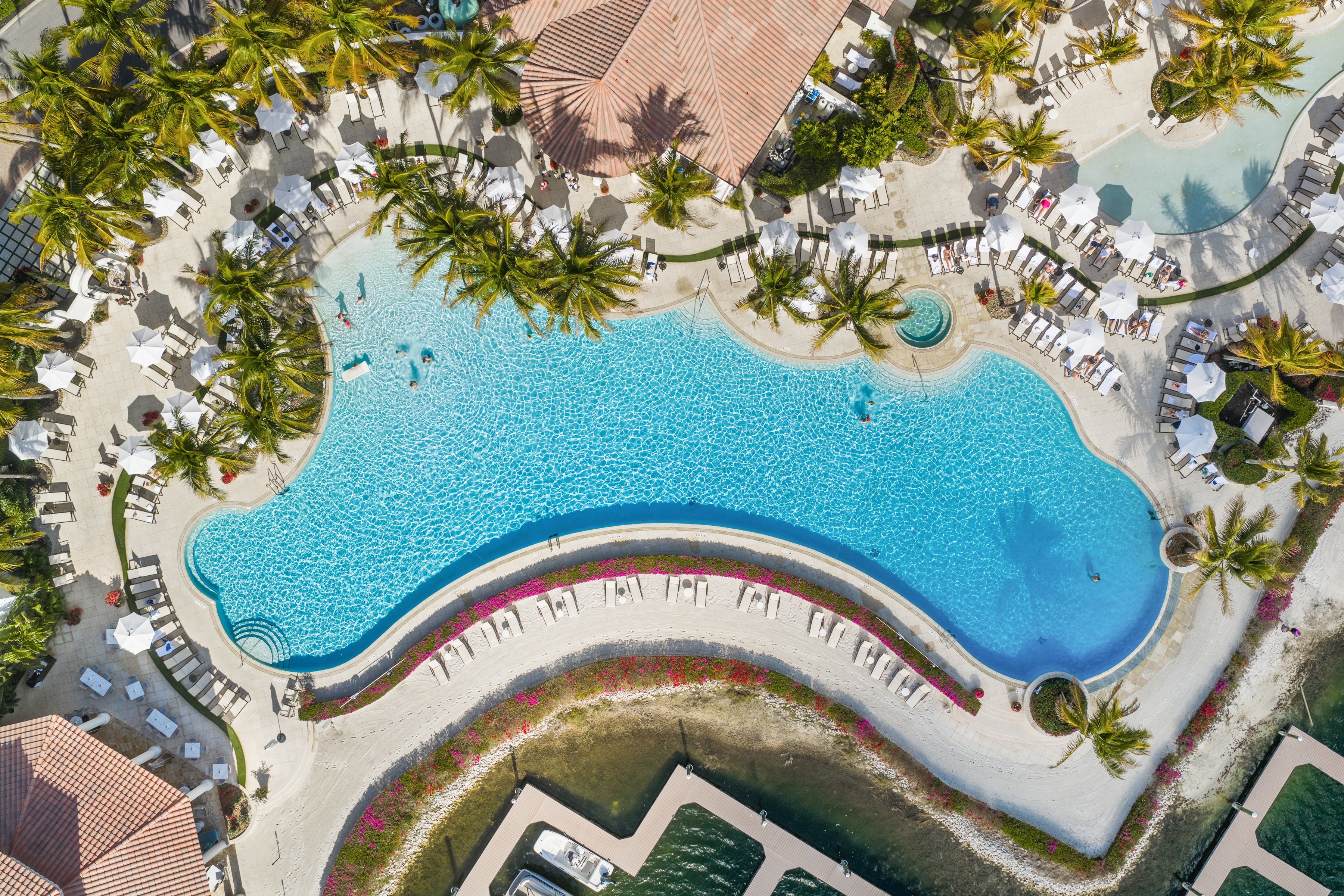 Aerial view of the zero-edge pool at Miromar Lakes Beach & Golf Club