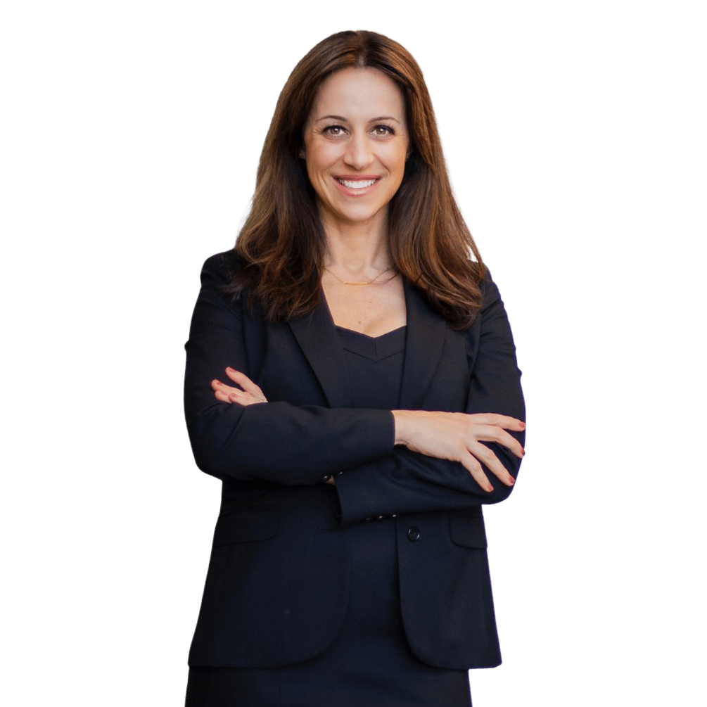 Elisa Jensen, smiling with her arms crossed in a dark blazer.