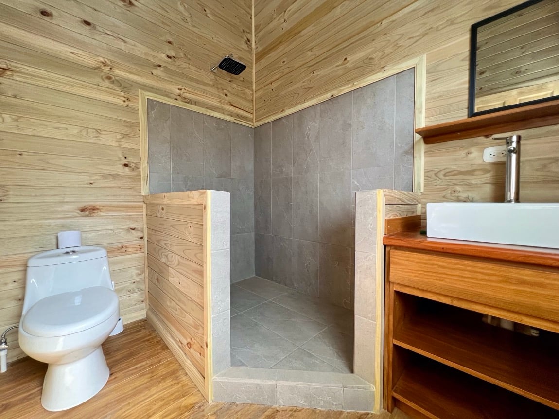 Eco-Luxury Home and Cabins with Waterfall, Ocean Views, and Organic Farming Potential