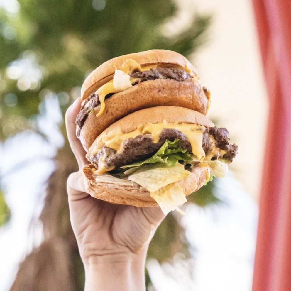 People toasting with wine glasses