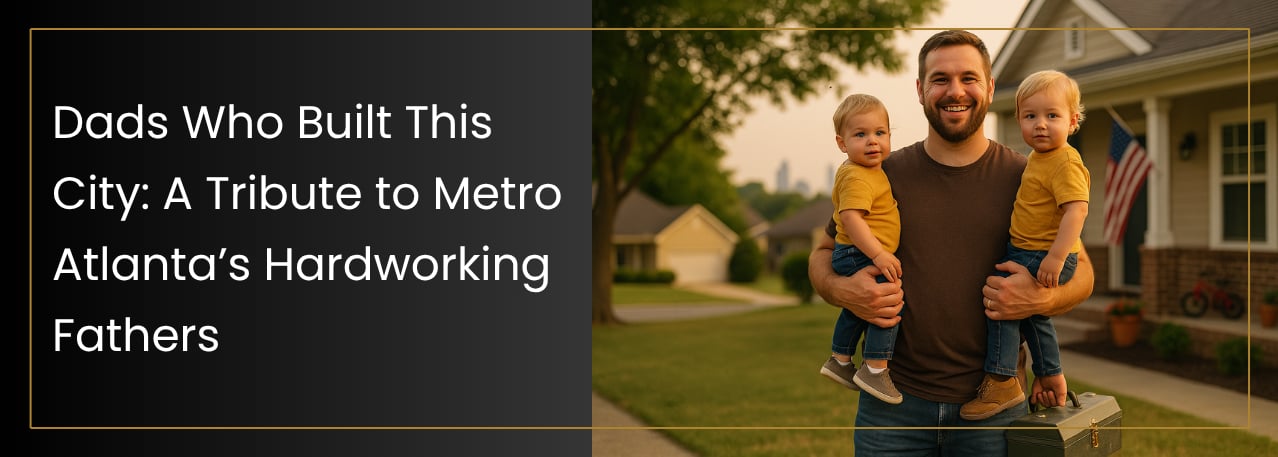 Smiling father holding two toddlers and a toolbox in front of a suburban home at sunset.