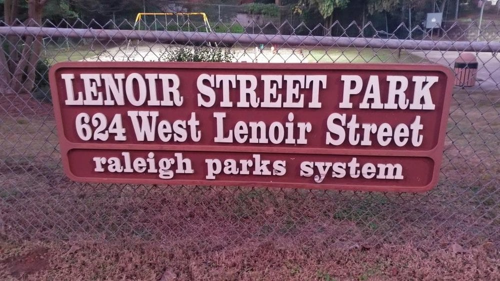 Sign for Lenoir Street Park, located at 624 West Lenoir Street, part of the Raleigh parks system.