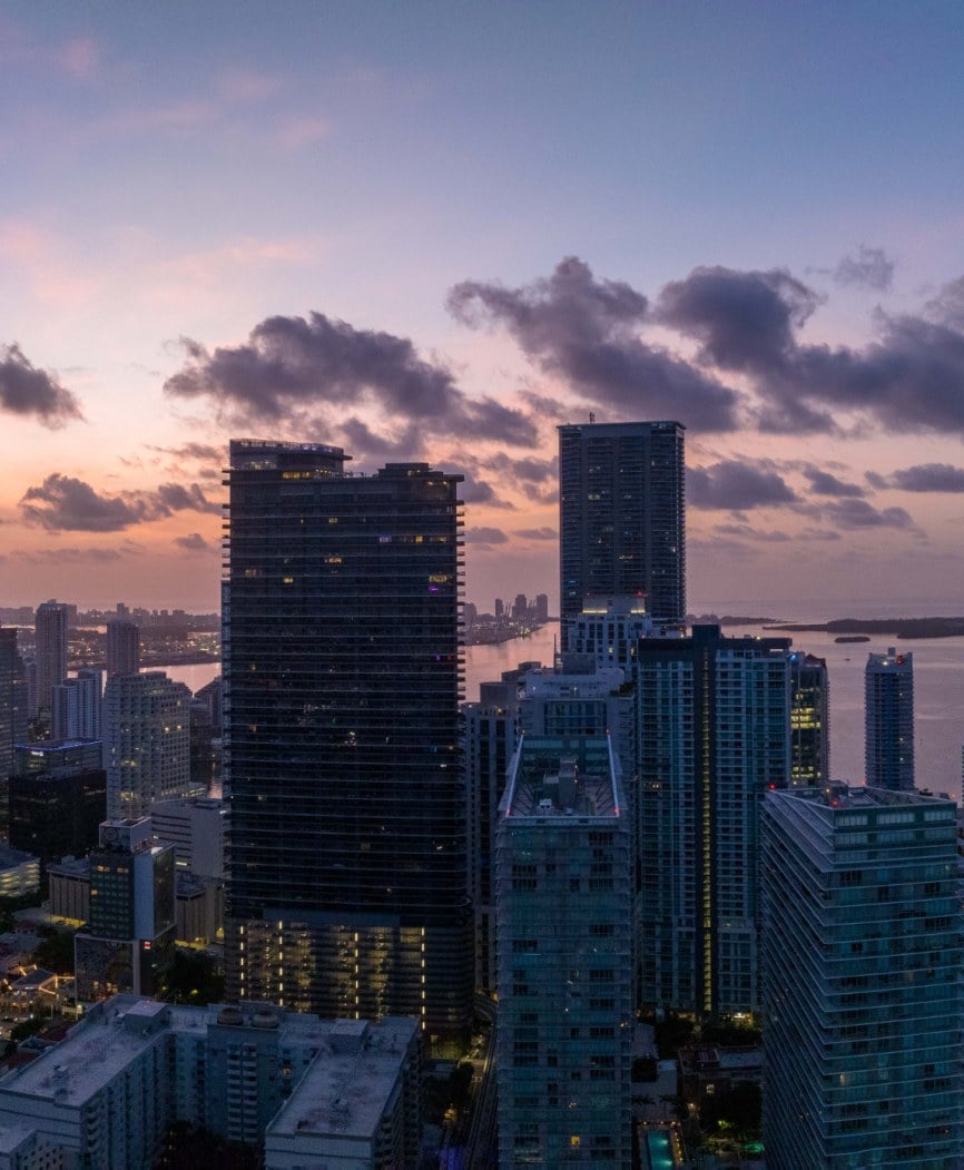 Rendering of aerial building exterior at sunset at Mercedes-Benz Places in Brickell, Miami.