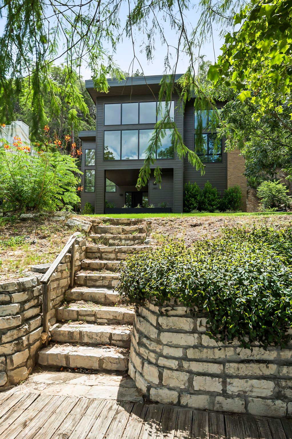 Limestone steps leading down to the boat dock on Lake Austin at 2403 Big Horn Drive, Austin.