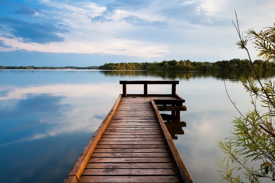 Calm lakefront view on Lake Minnetonka with dock and shoreline