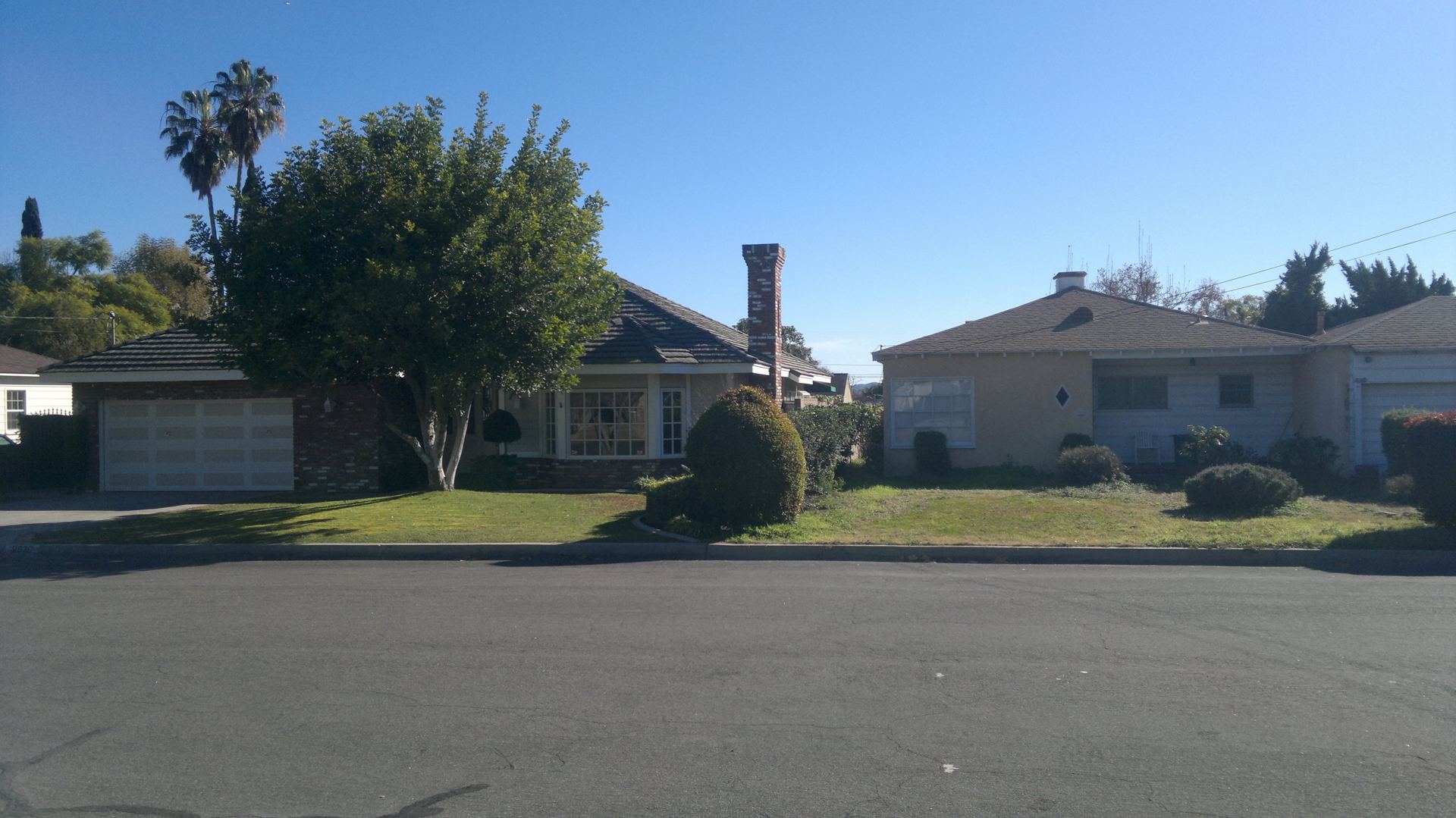 Single-story Temple City homes with front gardens and driveways