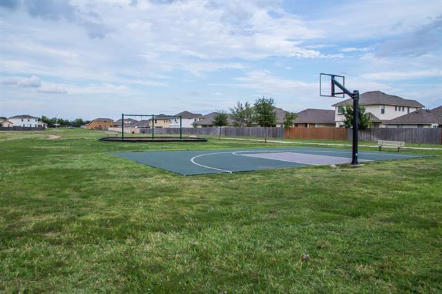 Rare Cul-de-Sac Gem in Manor – With No Neighbor on One Side and Access to HOA-owned Greenspace Right Outside Your Doorstep!