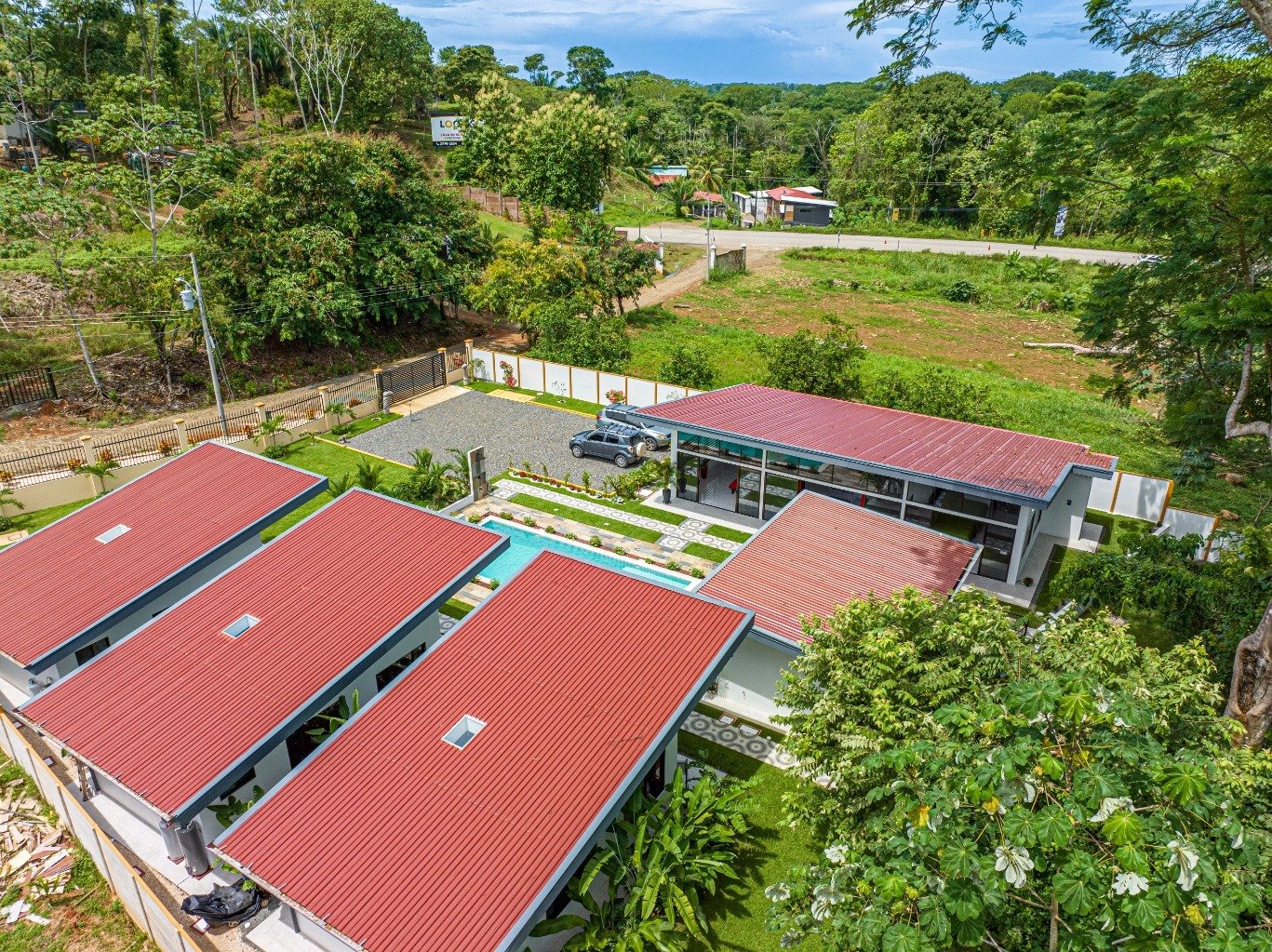 Incredible turnkey investment opportunity, 3 Rental villas, and a 2 Bedroom Home with a large pool.