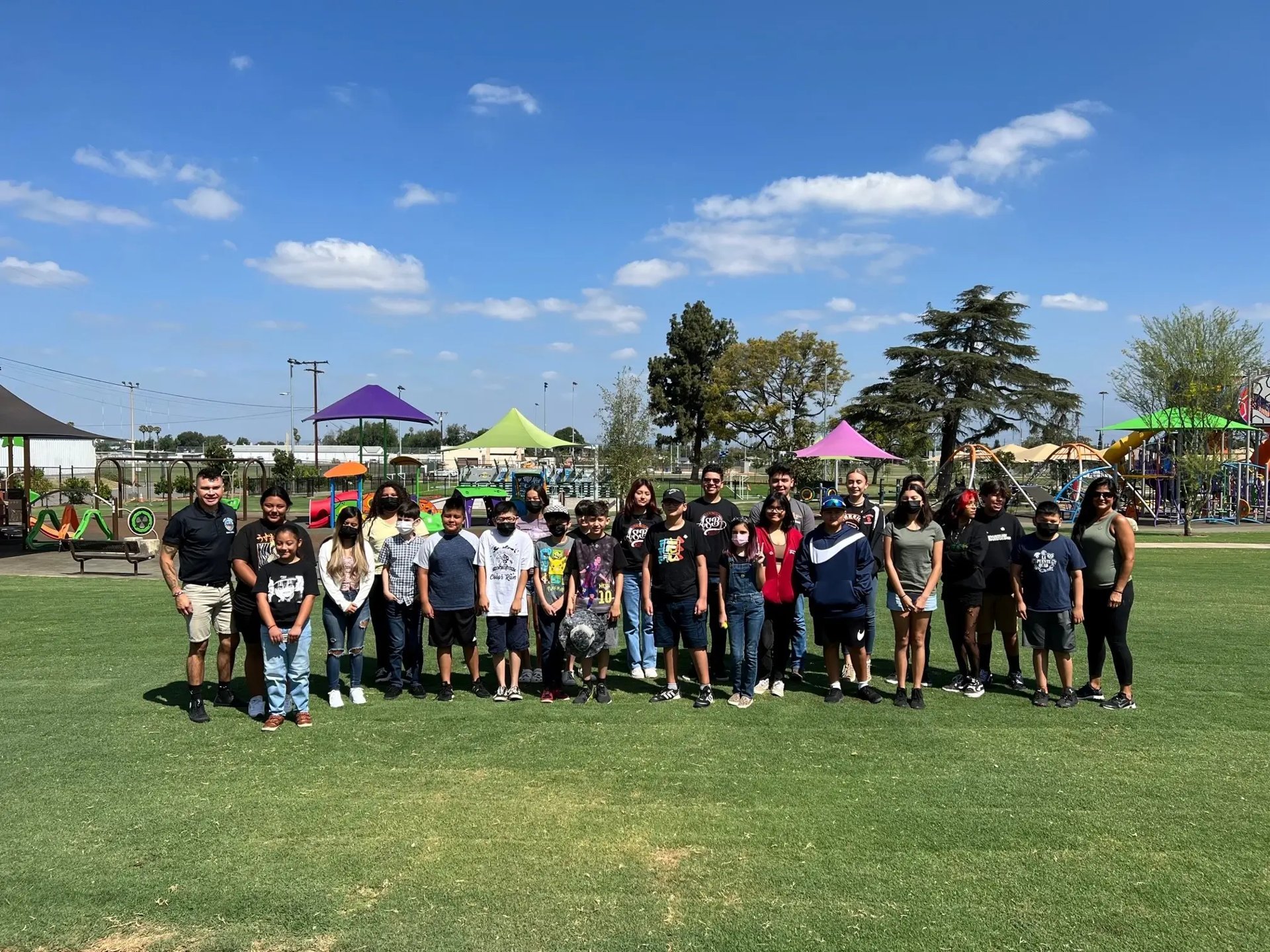 Community group on the lawn at La Puente Park in a city-published photograph