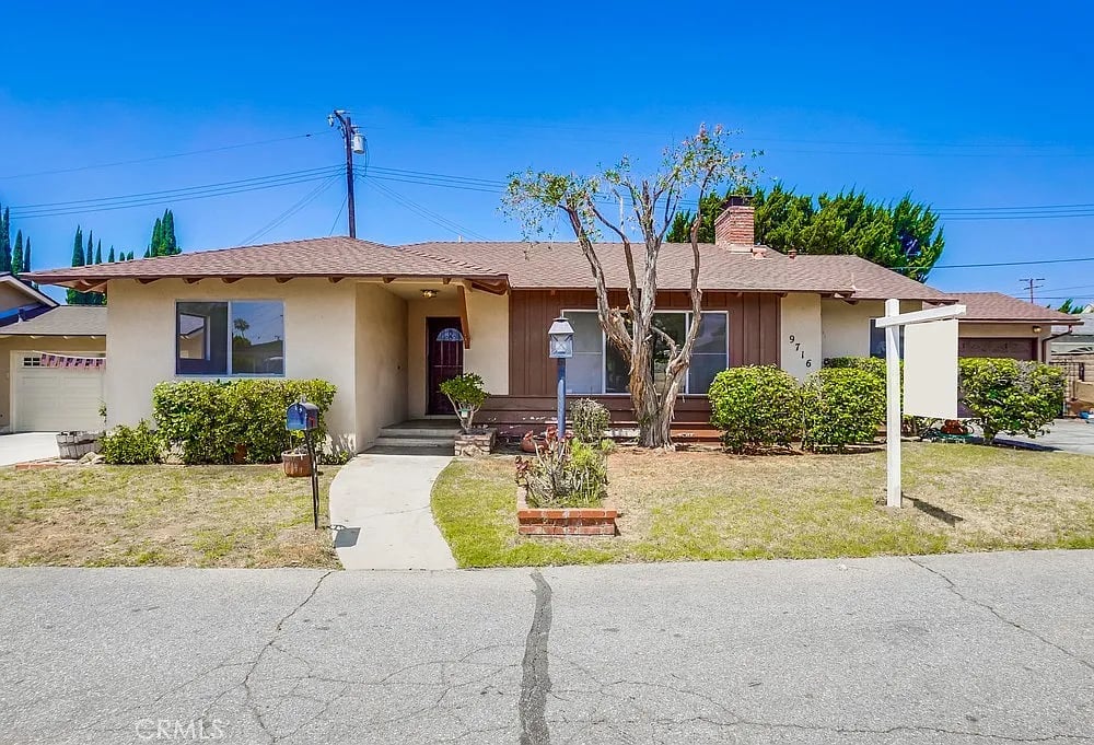 9716 E Camino Real Ave