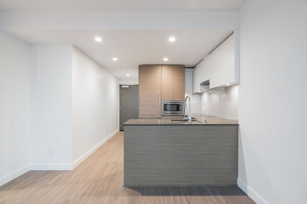 13615 Fraser Hwy, #402