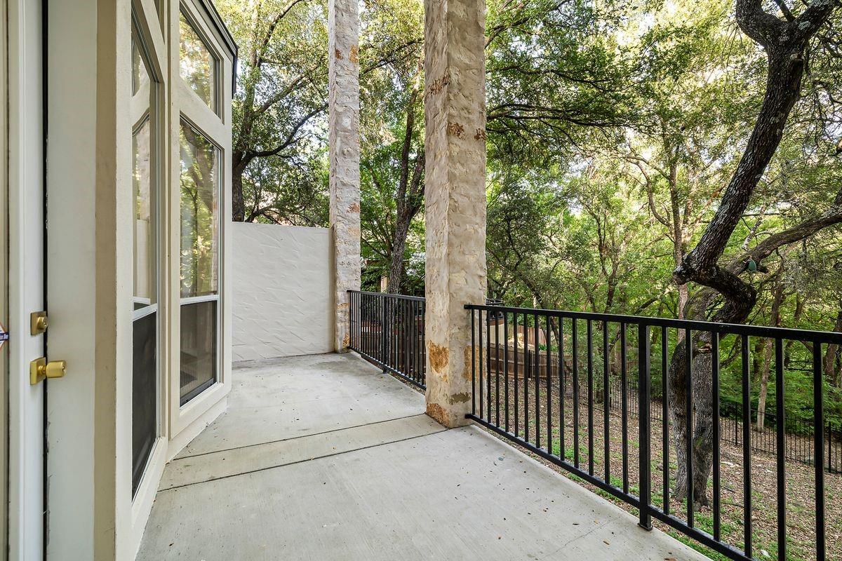 Covered balcony with a greenbelt view, Barton Hollow, Westlake, Austin.