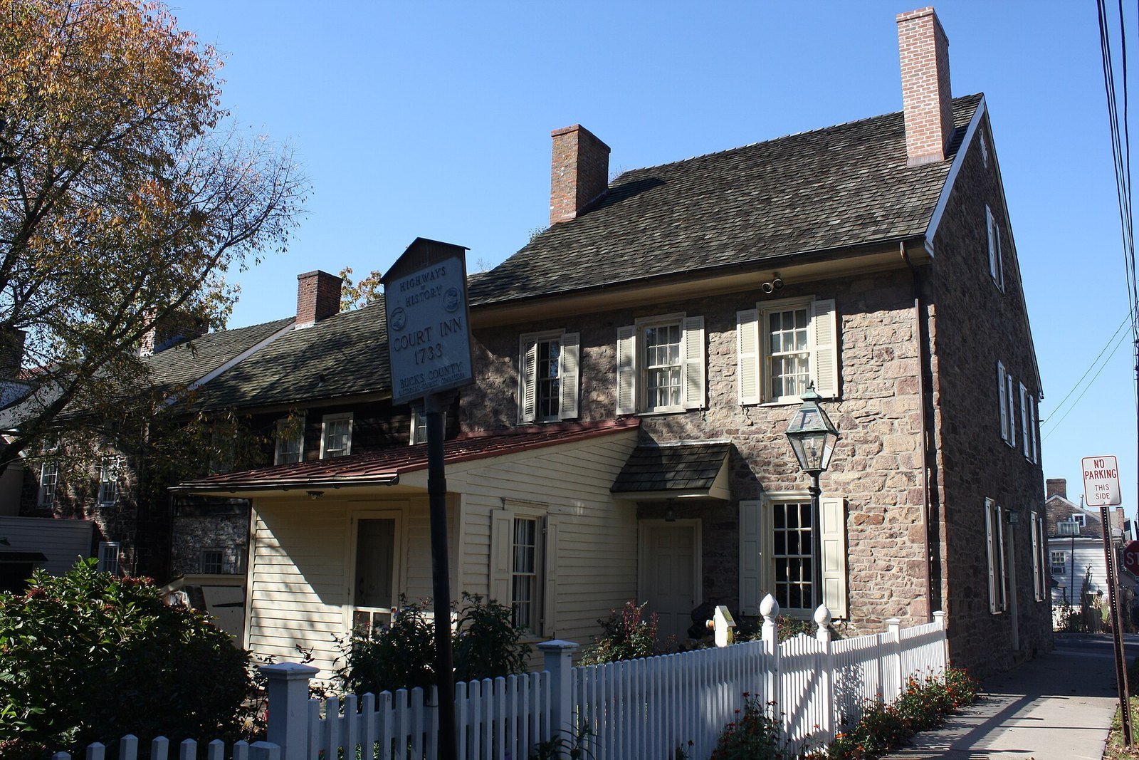 The 18th-century stone Court Inn on a sunny day in Newtown, PA