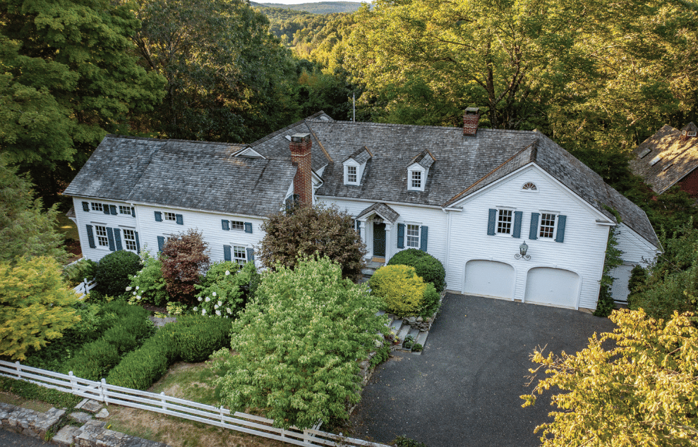 Idyllic Period Colonial with Pool Set Along Tranquil Town Road.